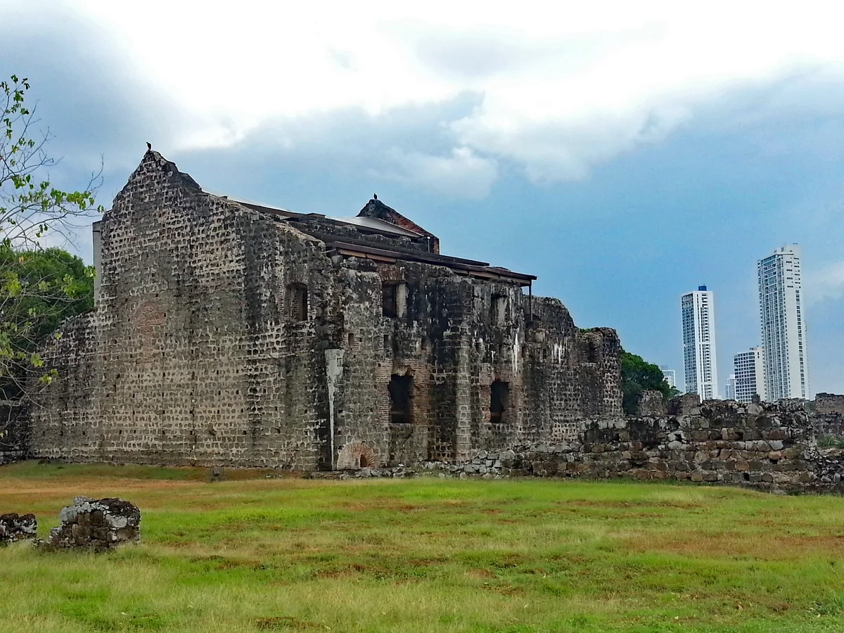 Panamá Viejo ruins with modern Panama City buildings in the background